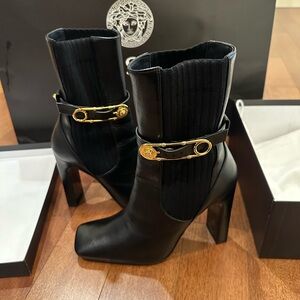 Versace Black Heeled Boots with Gold Buckles